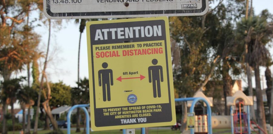 Social distancing sign at Lake Park, Huntington Beach, CA. 
