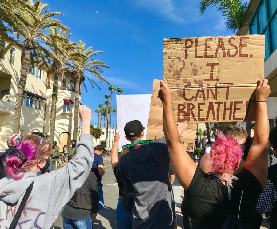 Black Lives Matter protesters in Huntington Beach standing up to police. Photography by: Amber Juarez.