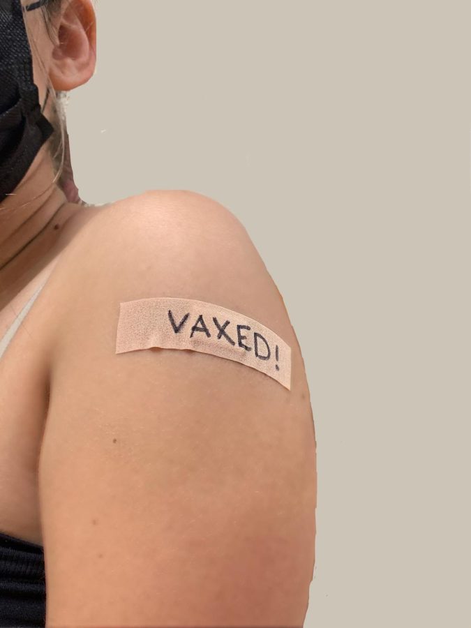 Kelsea Andrews vaccine sticker. Photography by: Christian Grombone