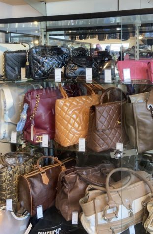 Consignment designer bags on display for sale at 2nd Street USA in Costa Mesa, California. Photography by: Elise Bitgood