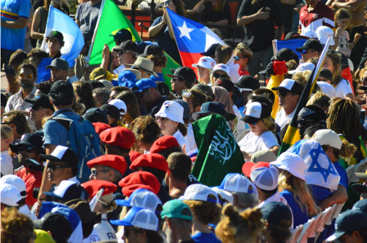 The diverse crowd at the opening ceremony of the ISA World Surfing Games. (Photography by: Lila Concepcion)