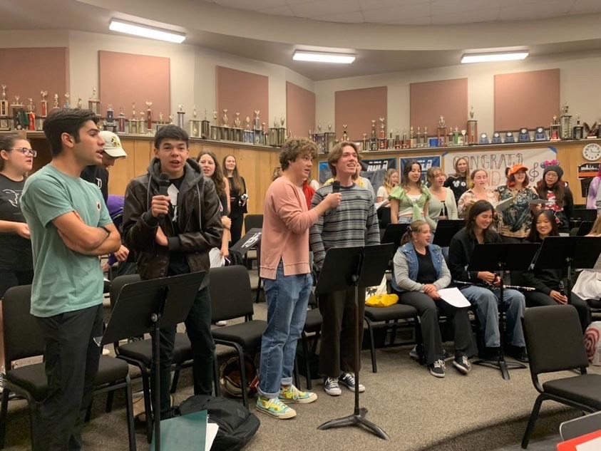 The cast of Newsies practicing a full run thorough of the show. (Photography by: Sarah Hentges)