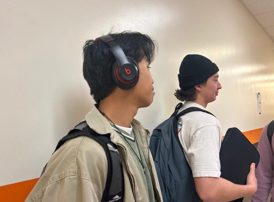 Huntington Beach High School sophomore, Ian Serrano, listening to Beabadoobe during passing periods. (Photography by: Elisha Stenseng)