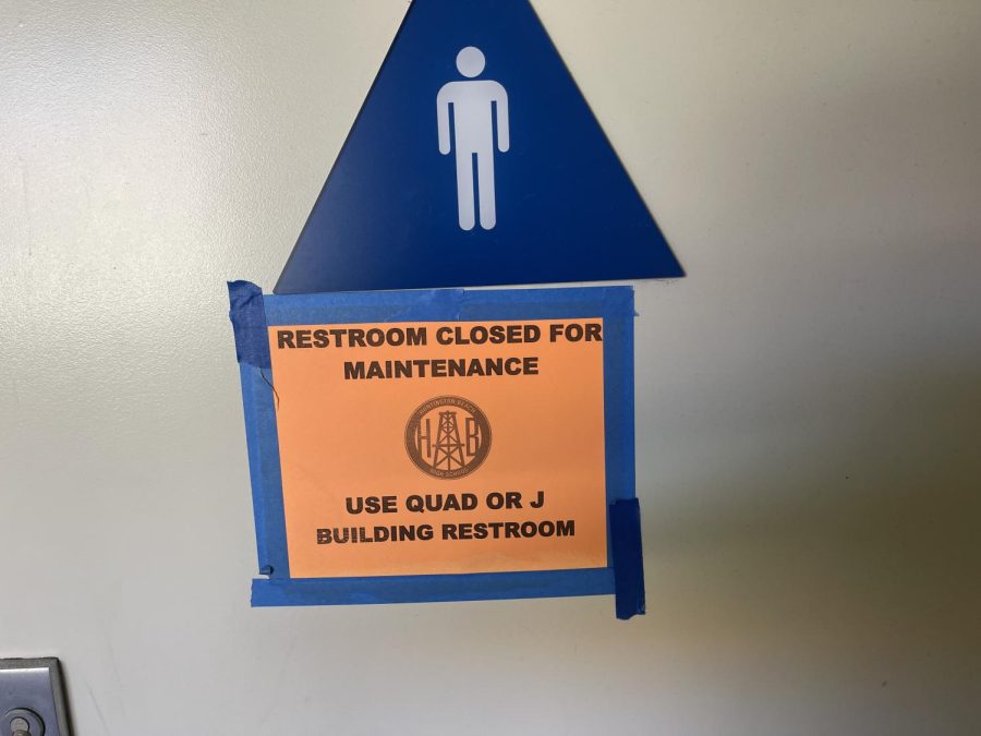 The sign was put up by the school faculty when the bathrooms closed down. (Photography by: August Berrios)