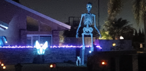 A photo of a spine-chilling decorated house for Halloween. 