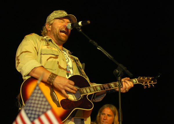Toby Keith preforms for service members at Camp Liberty Post Exchange during Tour. posted to DVIDS.net by Aaron Rosencrans.