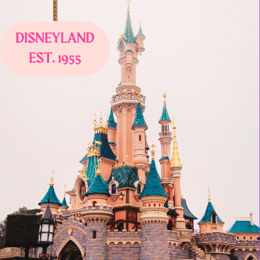 The Sleeping Beauty Castle at Disneyland with a sign hanging above that reads, DISNEYLAND/EST. 1955 (Image by: Ava Twogood)