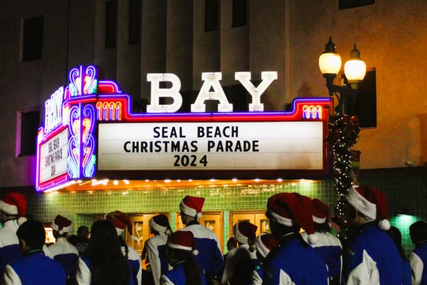 “Seal Beach Christmas Parade 2024” sign on the Bay Theater on Main Street, Seal Beach.