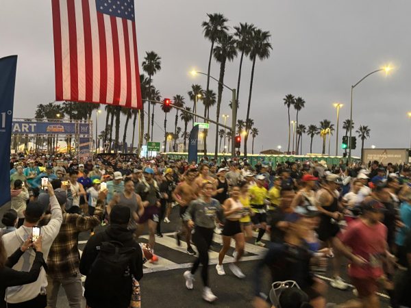 Hundreds of runners in the marathon on Pacific Coast Highway.