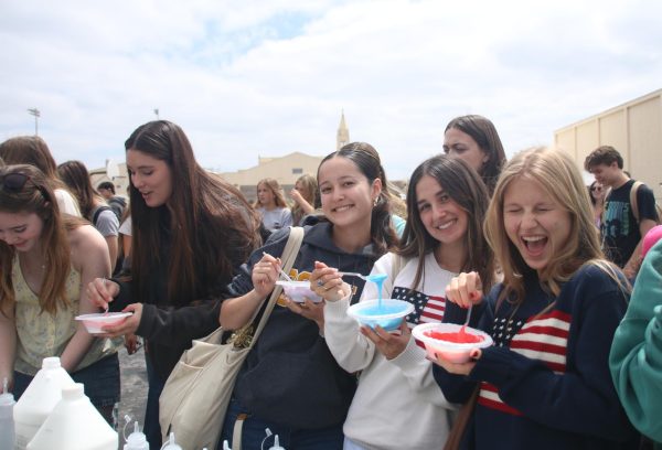 Bright colors and big smiles as students get hands-on making slime during the event.