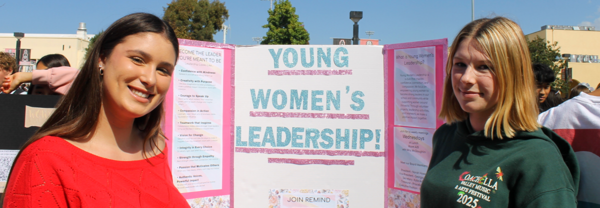 HBHS Juniors Howell (left) and Reed (right) promote their Young Women's Leadership Club for the first time at 2025-2026 Club Rush.